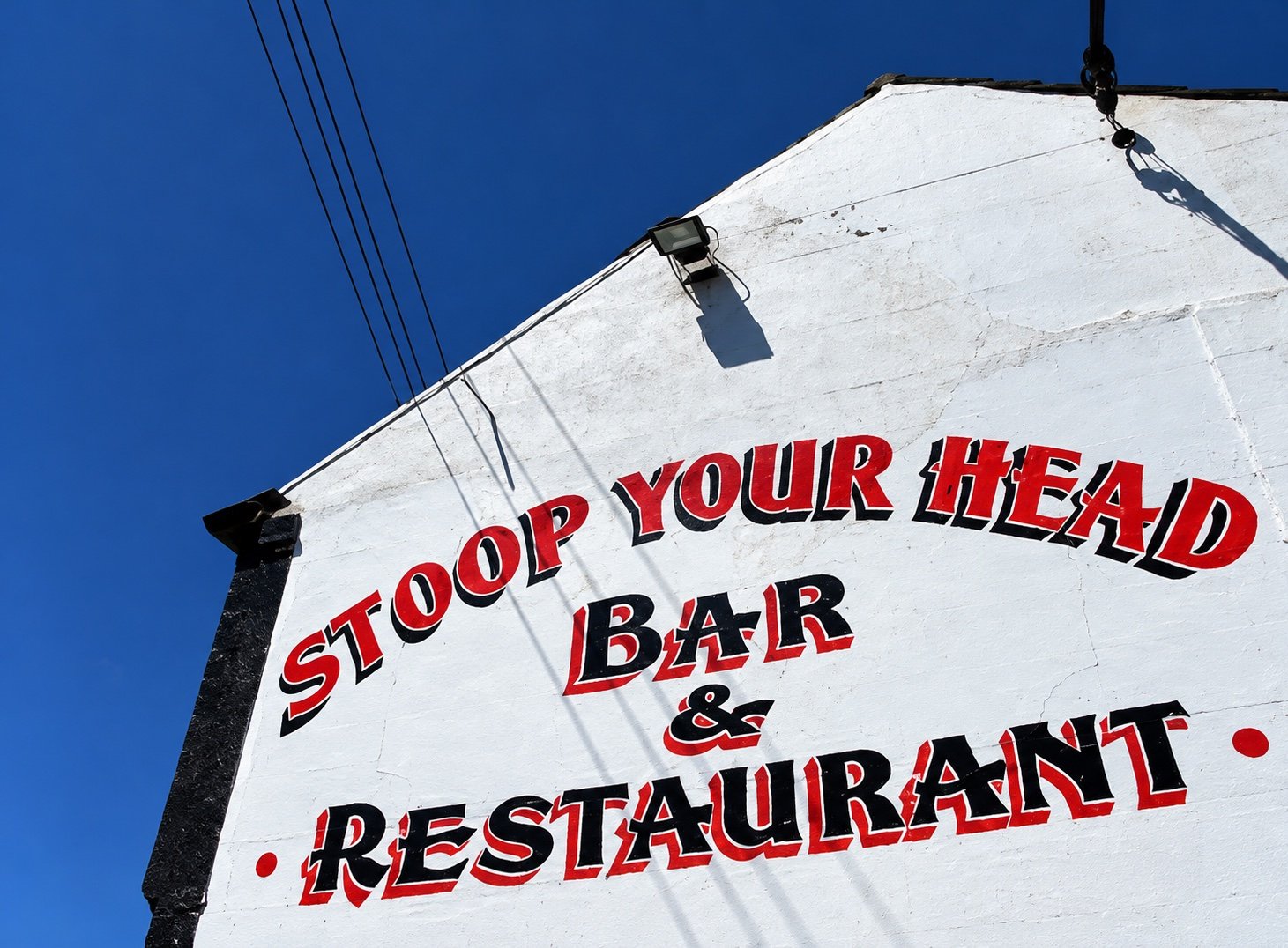 Stoop Your Head restaurant sign in Skerries